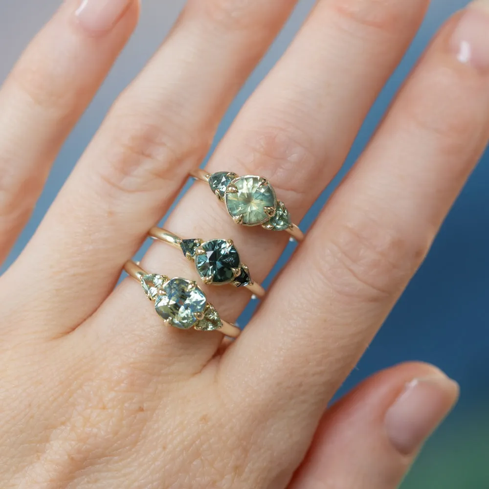 1.10ct Round Deep Teal Green Sapphire and Trillion Parti Sapphire Low Profile Ring in 14k Green Gold