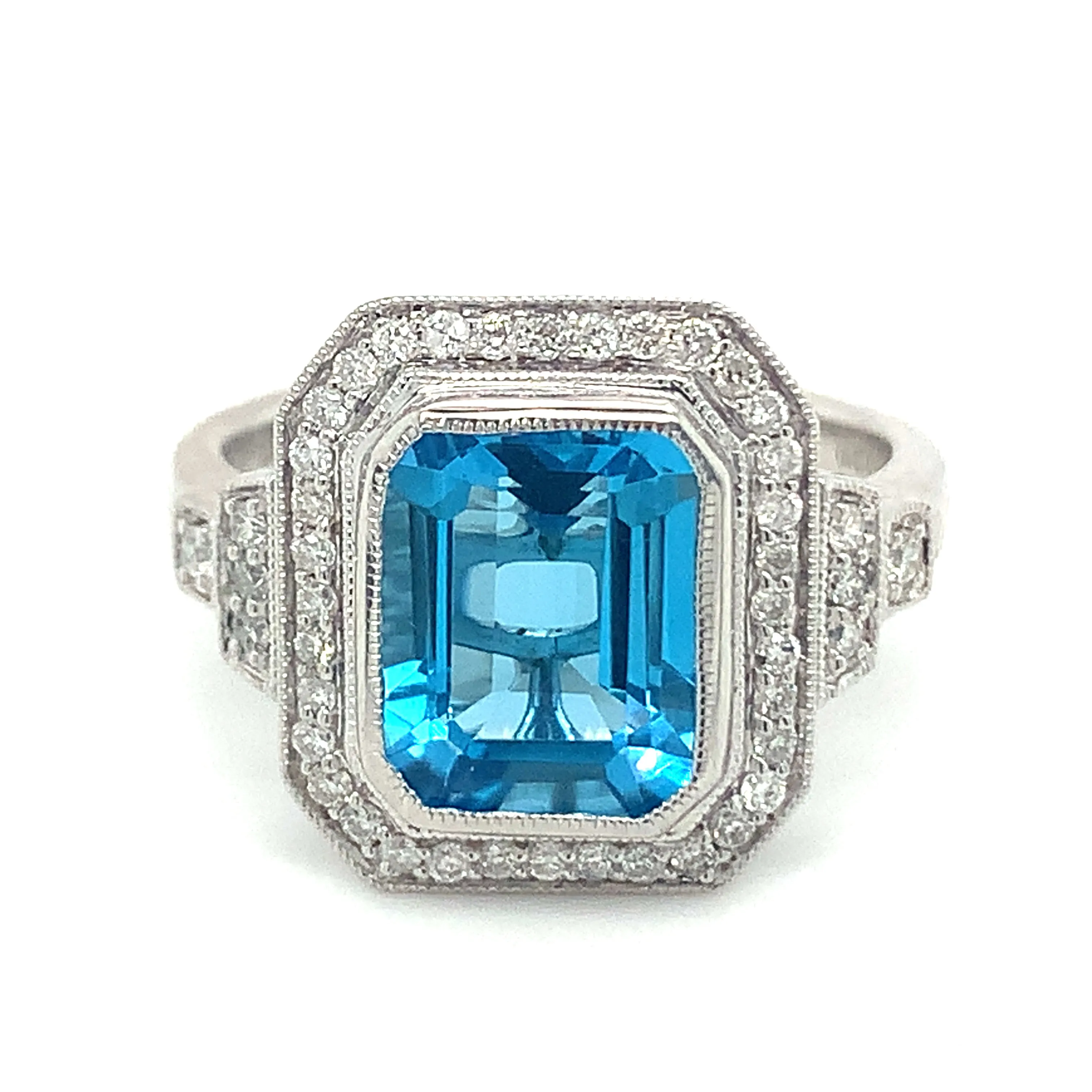 9ct White Gold 4.18ct Emerald Cut Blue Topaz and Diamond Pave Set Halo
