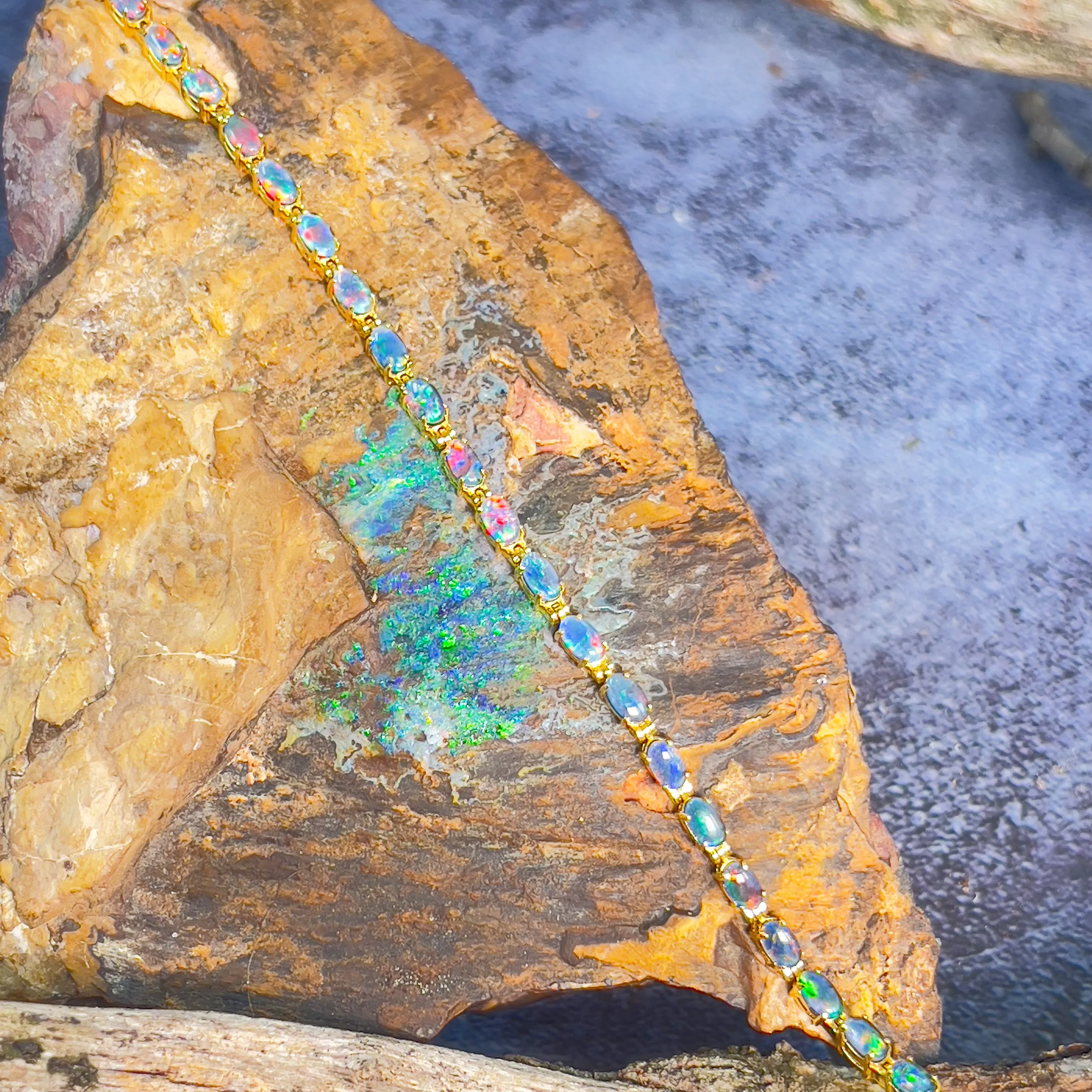 Gold plated sterling silver 5x3mm Opal triplet tennis bracelet design