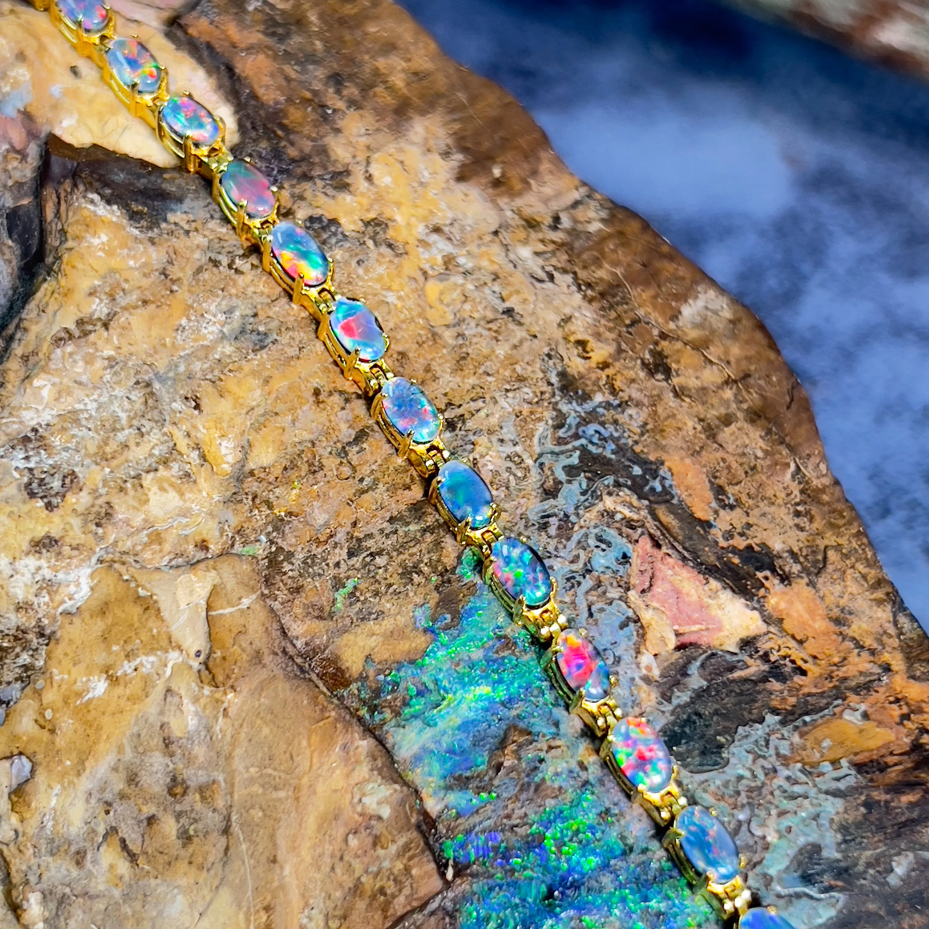 Gold plated sterling silver 5x3mm Opal triplet tennis bracelet design