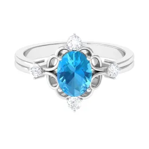 Oval Swiss Blue Topaz Cocktail Ring with Diamond