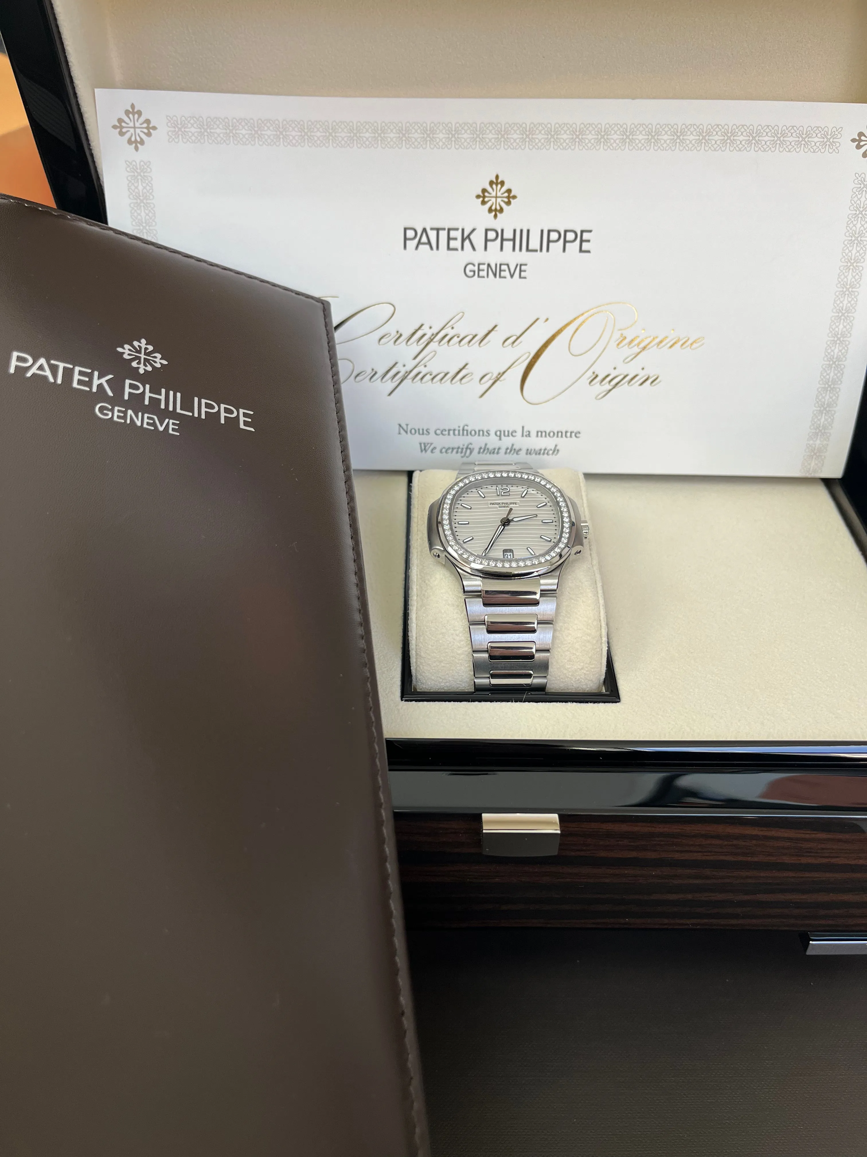 Patek Philippe Nautilus Diamond Bezel Silver Index Dial Reference #7118/1200A-010