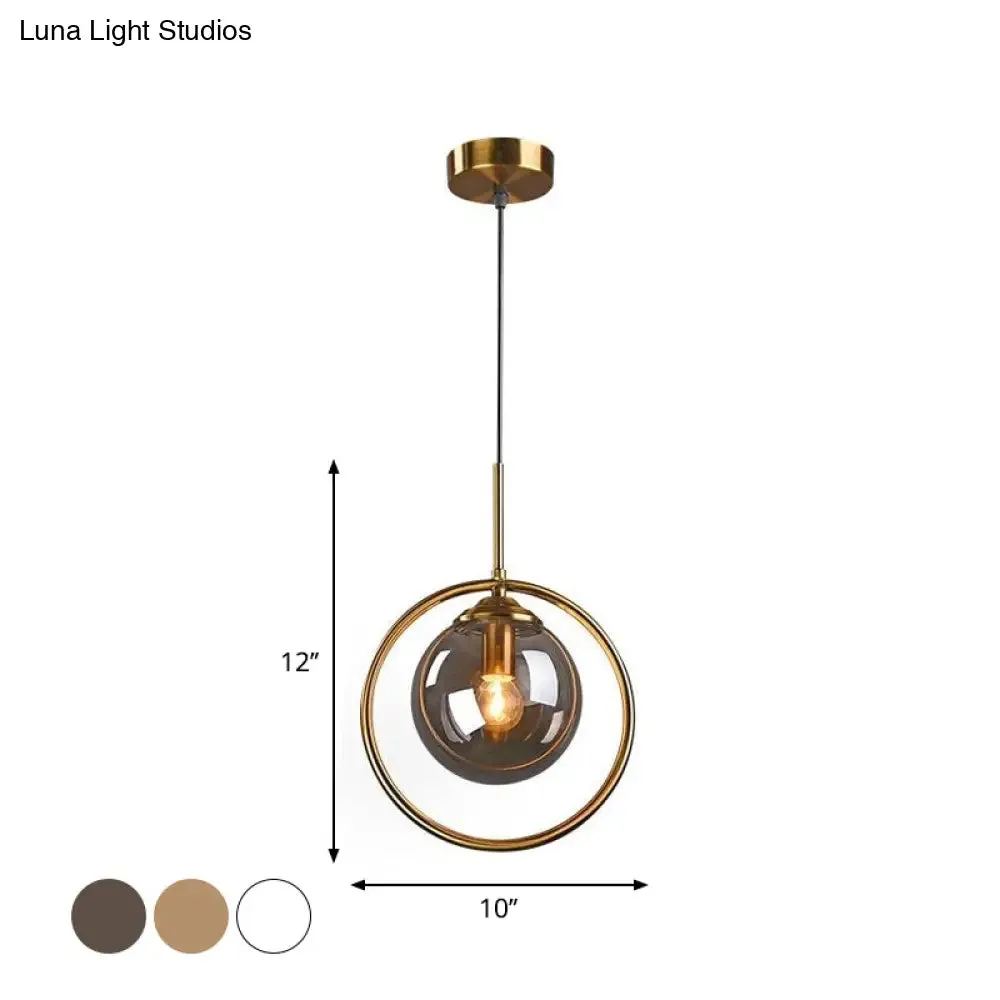 Postmodern Glass Pendant Light with Brass Ring for Bedroom - Single-Bulb Globe Down Lighting in Clear, Amber, and Smoke Grey