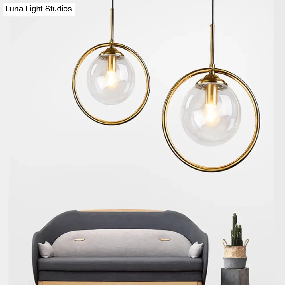 Postmodern Glass Pendant Light with Brass Ring for Bedroom - Single-Bulb Globe Down Lighting in Clear, Amber, and Smoke Grey