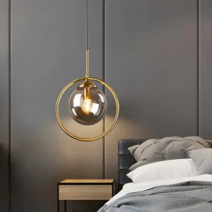 Postmodern Glass Pendant Light with Brass Ring for Bedroom - Single-Bulb Globe Down Lighting in Clear, Amber, and Smoke Grey