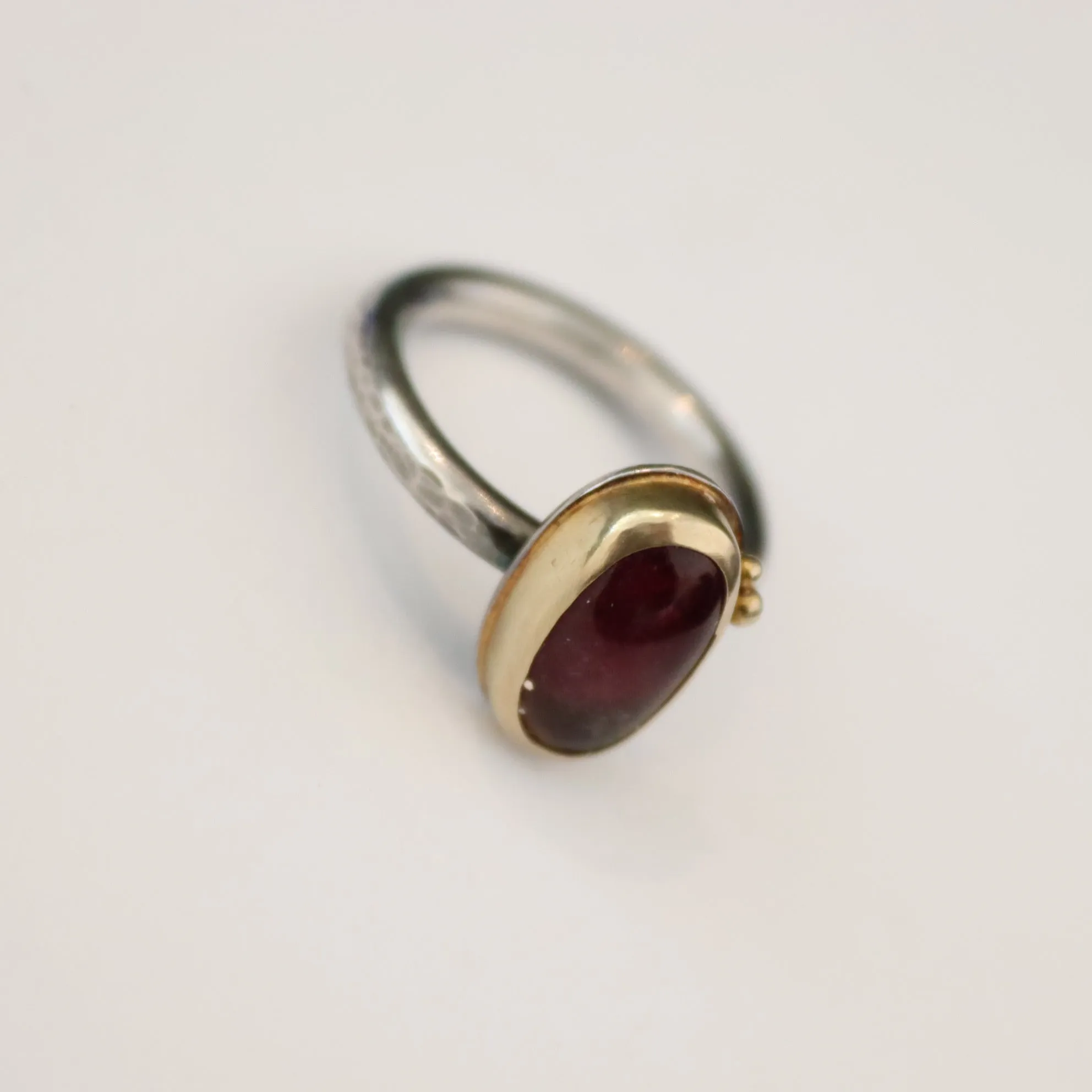 Red Tourmaline Cabochon in 18k gold bezel and Accents on Sterling Silver Oxidized Ring